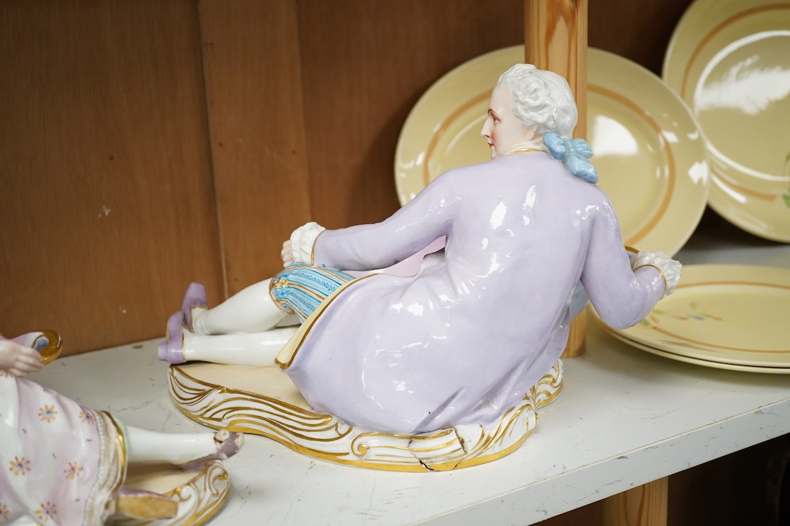 A pair of French porcelain figural sweet meat dishes, late 19th century, 34.5cm